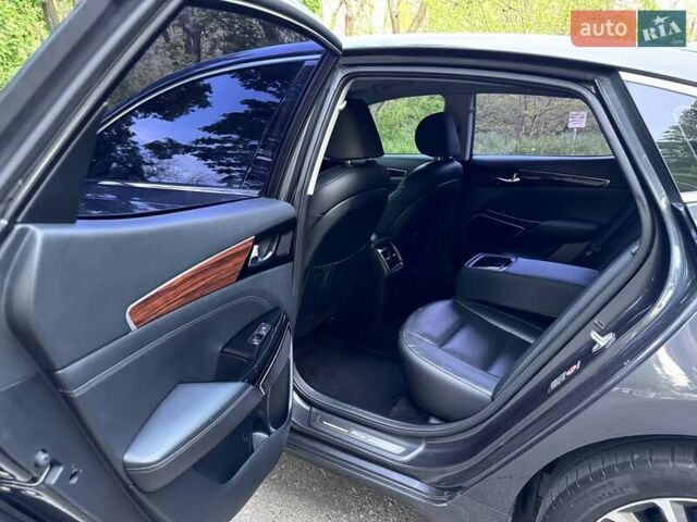 Серый Киа K7, объемом двигателя 3 л и пробегом 210 тыс. км за 13900 $, фото 38 на Automoto.ua