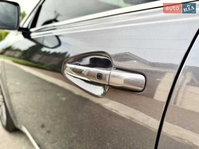 Серый Киа K7, объемом двигателя 3 л и пробегом 210 тыс. км за 13900 $, фото 18 на Automoto.ua