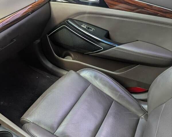 Серый Киа K7, объемом двигателя 2.2 л и пробегом 187 тыс. км за 15500 $, фото 11 на Automoto.ua