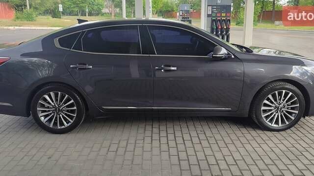 Серый Киа K7, объемом двигателя 3 л и пробегом 191 тыс. км за 13900 $, фото 3 на Automoto.ua