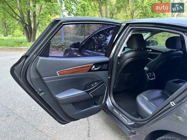 Серый Киа K7, объемом двигателя 3 л и пробегом 210 тыс. км за 13900 $, фото 36 на Automoto.ua