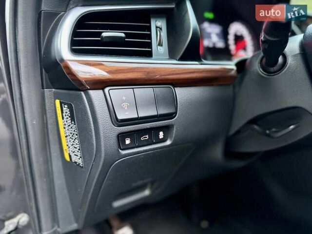 Серый Киа K7, объемом двигателя 3 л и пробегом 210 тыс. км за 13900 $, фото 32 на Automoto.ua