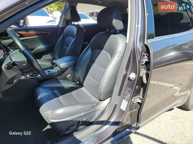 Серый Киа K7, объемом двигателя 2.2 л и пробегом 155 тыс. км за 16200 $, фото 4 на Automoto.ua