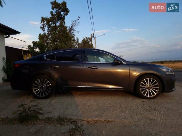 Серый Киа K7, объемом двигателя 3 л и пробегом 270 тыс. км за 14500 $, фото 3 на Automoto.ua