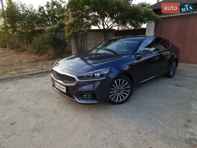 Серый Киа K7, объемом двигателя 3 л и пробегом 270 тыс. км за 14500 $, фото 2 на Automoto.ua