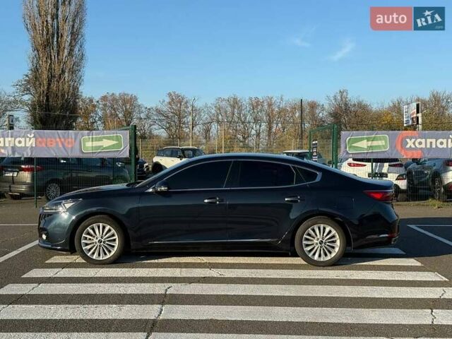 Синий Киа K7, объемом двигателя 3 л и пробегом 210 тыс. км за 16200 $, фото 4 на Automoto.ua