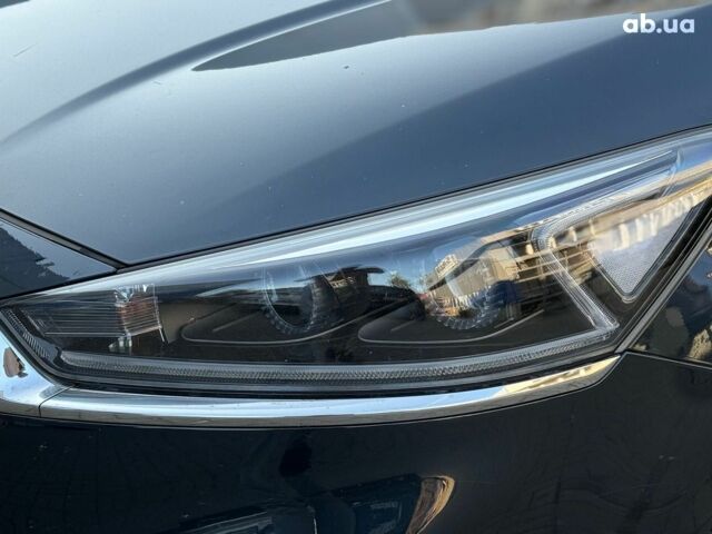 Синий Киа K7, объемом двигателя 3 л и пробегом 195 тыс. км за 18490 $, фото 4 на Automoto.ua