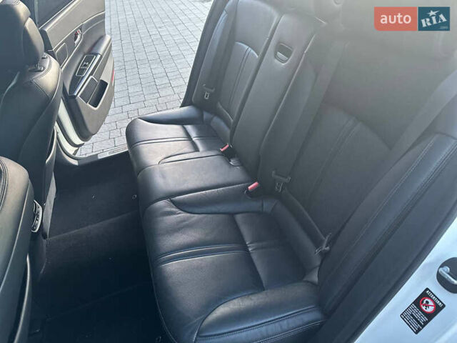 Білий Кіа K900, об'ємом двигуна 5.04 л та пробігом 130 тис. км за 19500 $, фото 25 на Automoto.ua