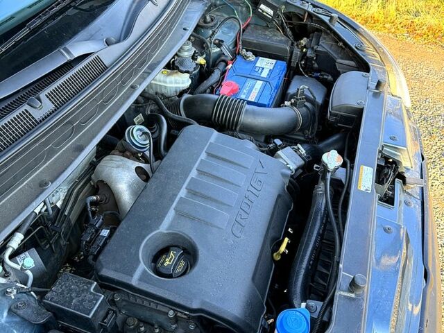 Синий Киа Soul, объемом двигателя 1.6 л и пробегом 225 тыс. км за 8000 $, фото 5 на Automoto.ua