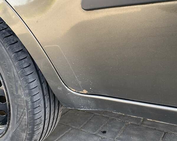 Зеленый Киа Soul, объемом двигателя 1.59 л и пробегом 260 тыс. км за 6500 $, фото 2 на Automoto.ua