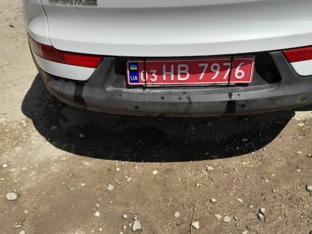Білий Кіа Sportage, об'ємом двигуна 1 л та пробігом 230 тис. км за 11400 $, фото 4 на Automoto.ua
