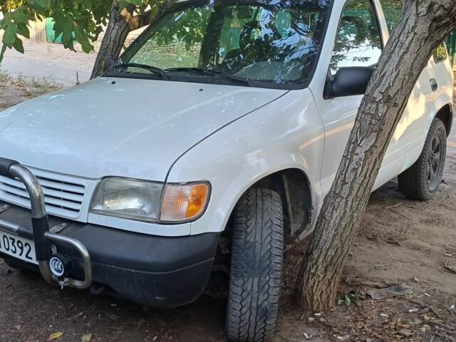 Белый Киа Sportage, объемом двигателя 2 л и пробегом 316 тыс. км за 4000 $, фото 2 на Automoto.ua