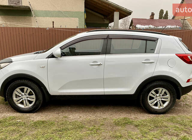Белый Киа Sportage, объемом двигателя 2 л и пробегом 244 тыс. км за 9990 $, фото 1 на Automoto.ua