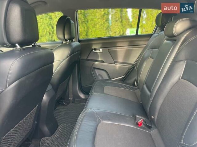 Білий Кіа Sportage, об'ємом двигуна 2 л та пробігом 215 тис. км за 13800 $, фото 8 на Automoto.ua