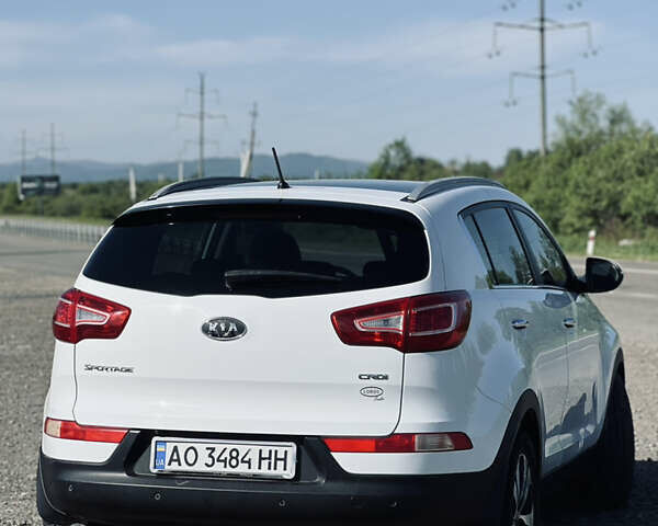 Білий Кіа Sportage, об'ємом двигуна 2 л та пробігом 211 тис. км за 12000 $, фото 3 на Automoto.ua