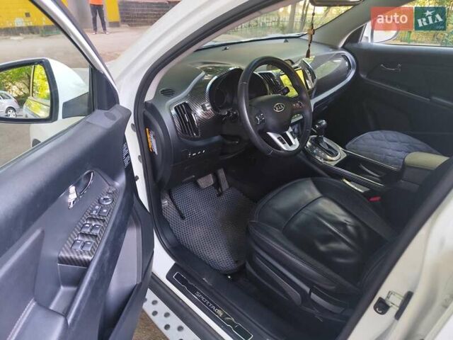 Білий Кіа Sportage, об'ємом двигуна 2 л та пробігом 125 тис. км за 14800 $, фото 5 на Automoto.ua