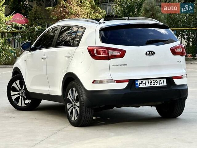 Білий Кіа Sportage, об'ємом двигуна 2 л та пробігом 165 тис. км за 13999 $, фото 7 на Automoto.ua