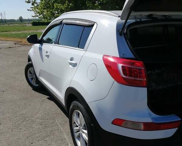 Білий Кіа Sportage, об'ємом двигуна 1.69 л та пробігом 142 тис. км за 11500 $, фото 19 на Automoto.ua