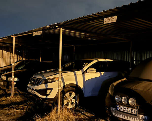 Білий Кіа Sportage, об'ємом двигуна 2.4 л та пробігом 265 тис. км за 10599 $, фото 46 на Automoto.ua