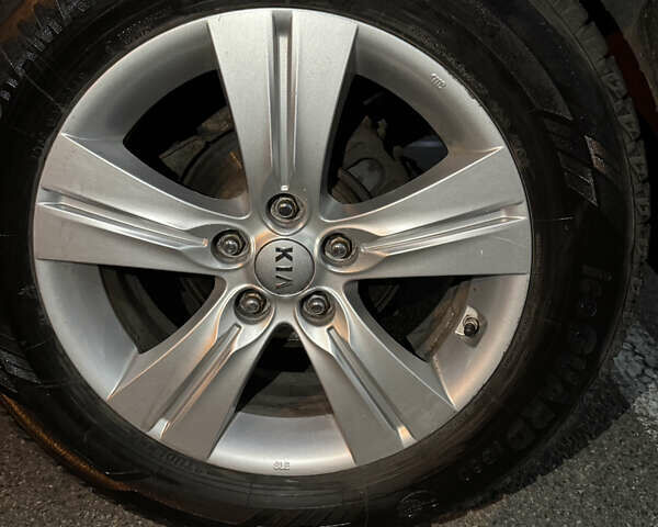 Білий Кіа Sportage, об'ємом двигуна 2.4 л та пробігом 265 тис. км за 10599 $, фото 33 на Automoto.ua