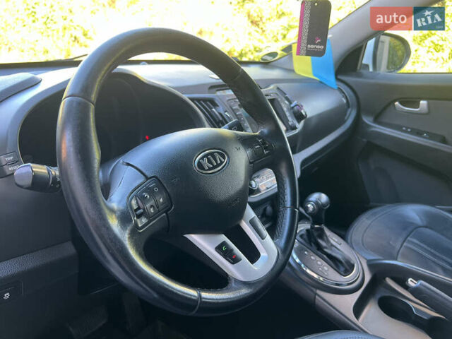 Белый Киа Sportage, объемом двигателя 2 л и пробегом 290 тыс. км за 12999 $, фото 26 на Automoto.ua