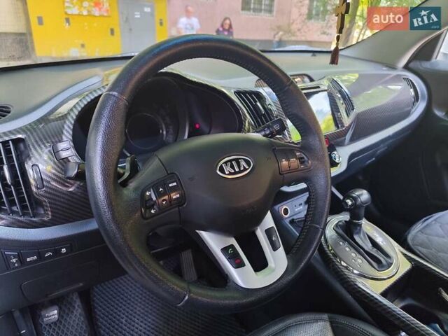 Білий Кіа Sportage, об'ємом двигуна 2 л та пробігом 125 тис. км за 14800 $, фото 9 на Automoto.ua