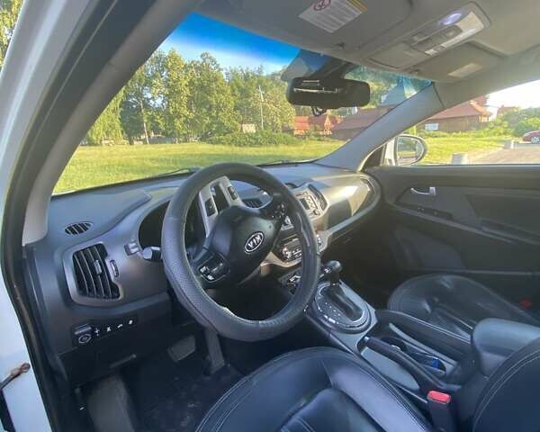 Білий Кіа Sportage, об'ємом двигуна 2 л та пробігом 133 тис. км за 13200 $, фото 12 на Automoto.ua