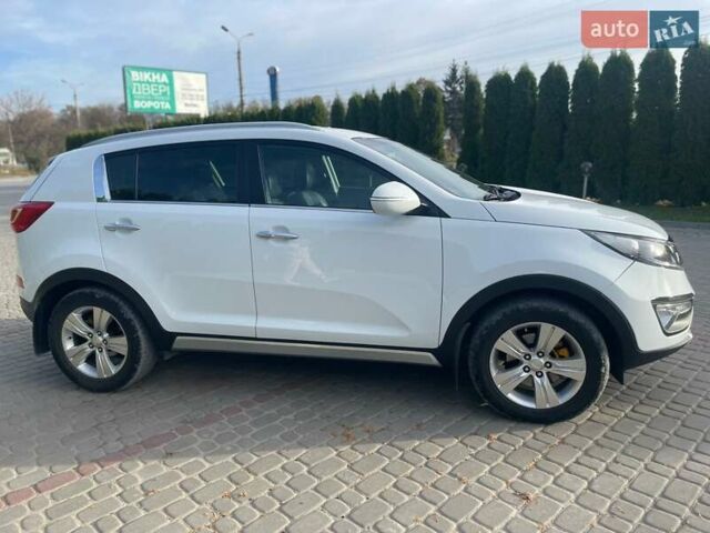 Білий Кіа Sportage, об'ємом двигуна 2 л та пробігом 215 тис. км за 13800 $, фото 5 на Automoto.ua