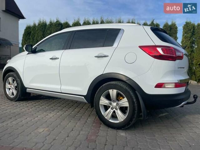 Білий Кіа Sportage, об'ємом двигуна 2 л та пробігом 215 тис. км за 13800 $, фото 6 на Automoto.ua