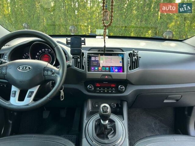 Білий Кіа Sportage, об'ємом двигуна 2 л та пробігом 215 тис. км за 13800 $, фото 15 на Automoto.ua