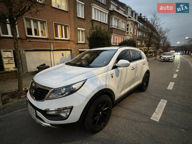 Білий Кіа Sportage, об'ємом двигуна 1.99 л та пробігом 165 тис. км за 14039 $, фото 7 на Automoto.ua