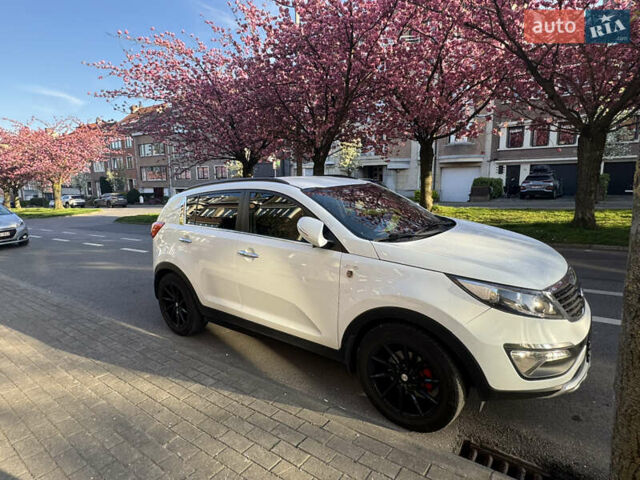 Білий Кіа Sportage, об'ємом двигуна 1.99 л та пробігом 165 тис. км за 14039 $, фото 2 на Automoto.ua