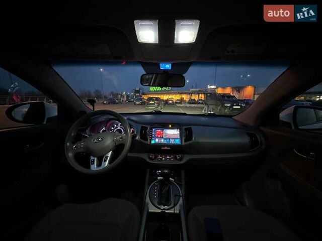 Білий Кіа Sportage, об'ємом двигуна 2.4 л та пробігом 265 тис. км за 10599 $, фото 16 на Automoto.ua