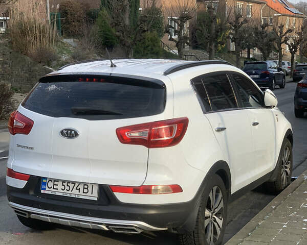 Білий Кіа Sportage, об'ємом двигуна 1.99 л та пробігом 165 тис. км за 14039 $, фото 12 на Automoto.ua