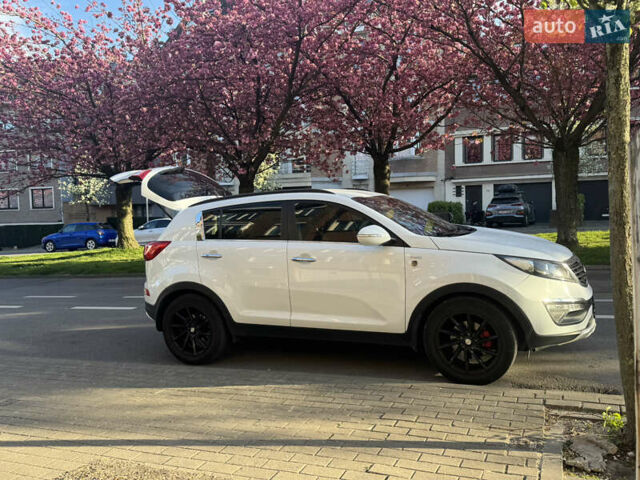 Білий Кіа Sportage, об'ємом двигуна 1.99 л та пробігом 165 тис. км за 14039 $, фото 3 на Automoto.ua