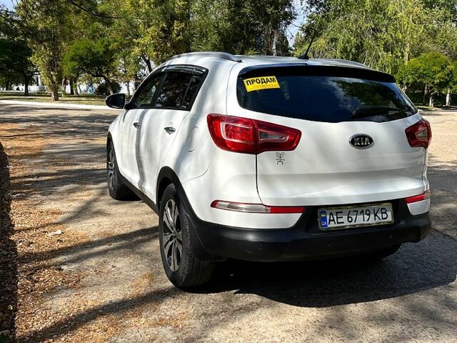 Білий Кіа Sportage, об'ємом двигуна 2 л та пробігом 183 тис. км за 12400 $, фото 2 на Automoto.ua