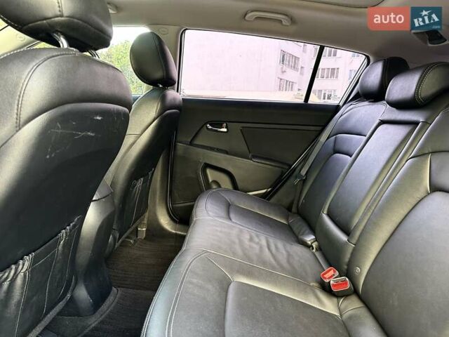 Білий Кіа Sportage, об'ємом двигуна 2 л та пробігом 165 тис. км за 13999 $, фото 12 на Automoto.ua