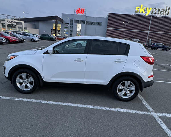 Білий Кіа Sportage, об'ємом двигуна 2.4 л та пробігом 265 тис. км за 10599 $, фото 8 на Automoto.ua