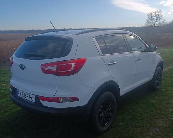 Білий Кіа Sportage, об'ємом двигуна 2 л та пробігом 173 тис. км за 11000 $, фото 13 на Automoto.ua