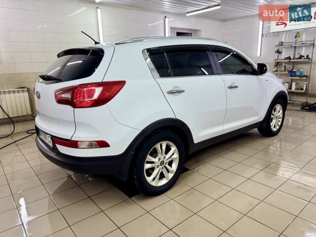 Білий Кіа Sportage, об'ємом двигуна 2 л та пробігом 161 тис. км за 11499 $, фото 10 на Automoto.ua