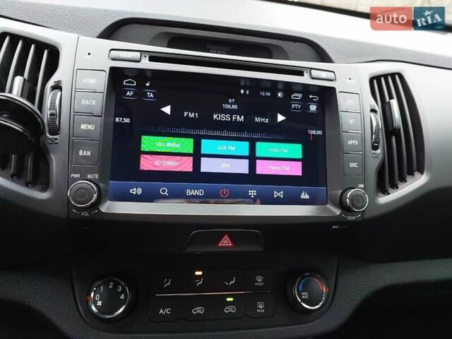 Белый Киа Sportage, объемом двигателя 1.69 л и пробегом 170 тыс. км за 11999 $, фото 20 на Automoto.ua