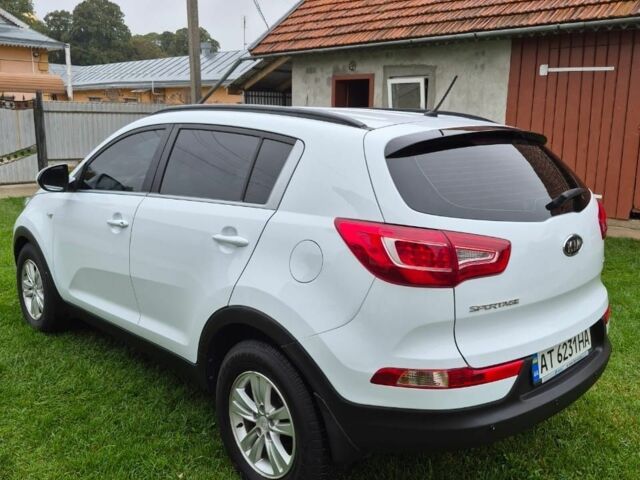 Білий Кіа Sportage, об'ємом двигуна 1.7 л та пробігом 98 тис. км за 13300 $, фото 7 на Automoto.ua