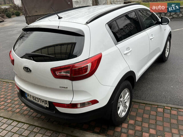 Білий Кіа Sportage, об'ємом двигуна 1.7 л та пробігом 98 тис. км за 13950 $, фото 27 на Automoto.ua