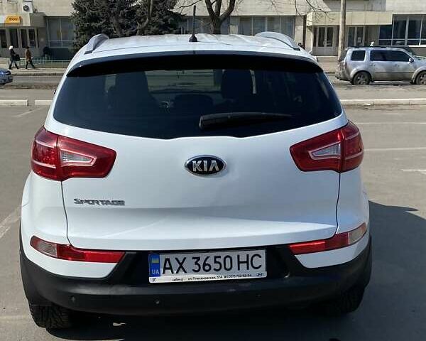 Белый Киа Sportage, объемом двигателя 2 л и пробегом 129 тыс. км за 15000 $, фото 1 на Automoto.ua