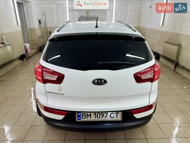 Білий Кіа Sportage, об'ємом двигуна 2 л та пробігом 161 тис. км за 11499 $, фото 14 на Automoto.ua