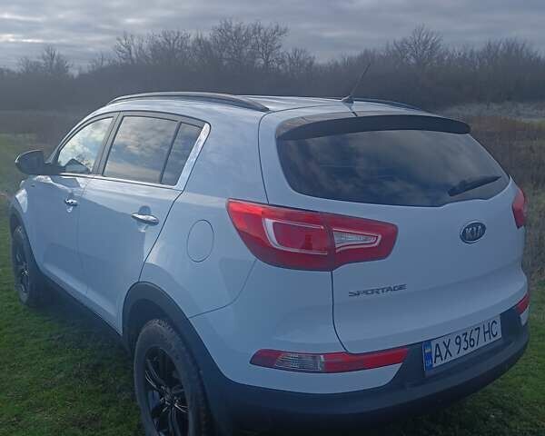 Білий Кіа Sportage, об'ємом двигуна 2 л та пробігом 173 тис. км за 11000 $, фото 14 на Automoto.ua