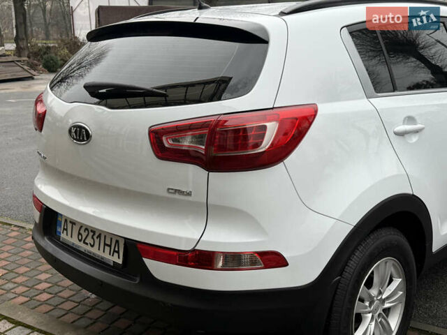 Білий Кіа Sportage, об'ємом двигуна 1.7 л та пробігом 98 тис. км за 13950 $, фото 26 на Automoto.ua