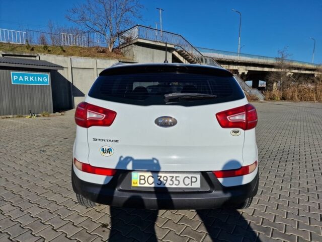 Білий Кіа Sportage, об'ємом двигуна 2 л та пробігом 170 тис. км за 11300 $, фото 5 на Automoto.ua