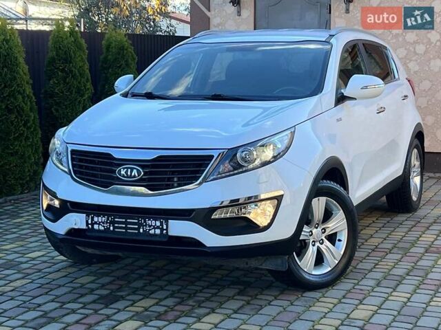 Білий Кіа Sportage, об'ємом двигуна 2 л та пробігом 223 тис. км за 14950 $, фото 44 на Automoto.ua