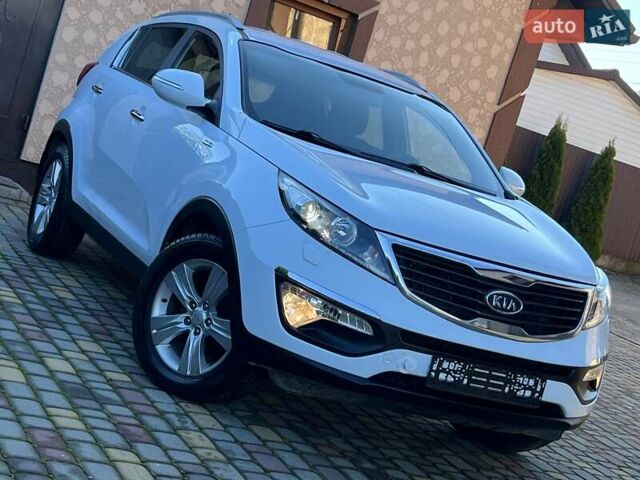 Білий Кіа Sportage, об'ємом двигуна 2 л та пробігом 223 тис. км за 14950 $, фото 48 на Automoto.ua